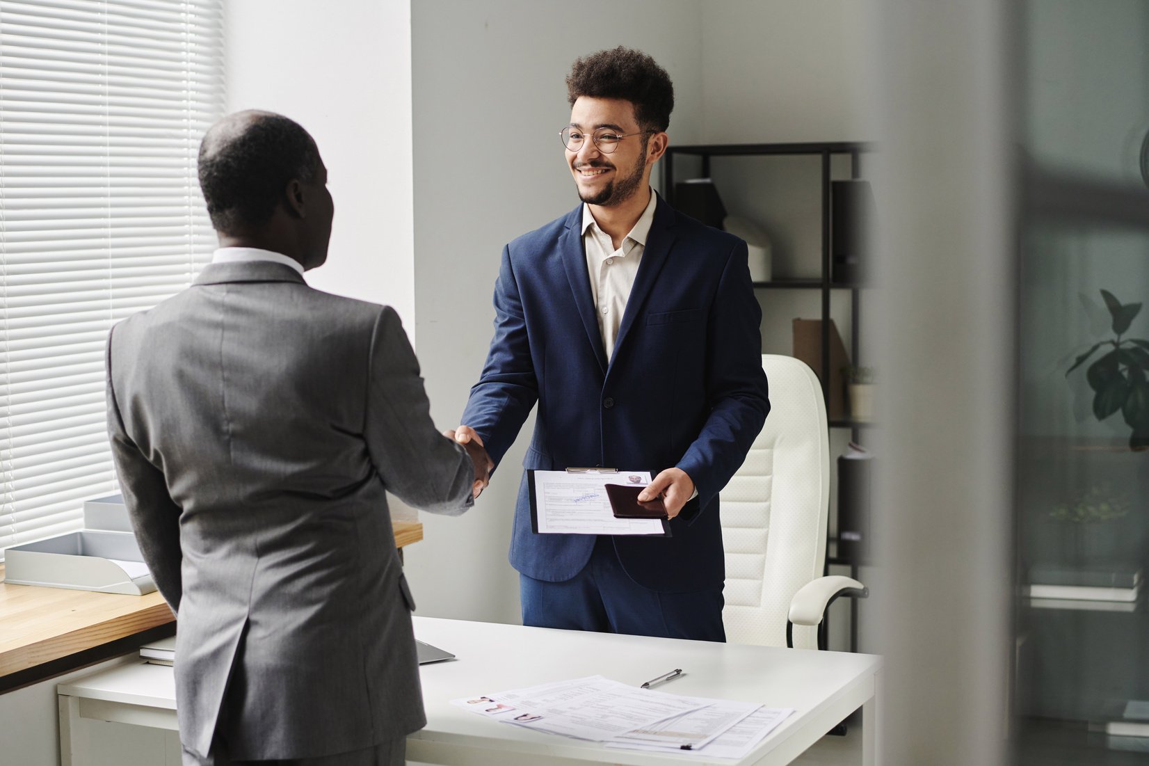 Specialist Congratulating Man of Getting Visa