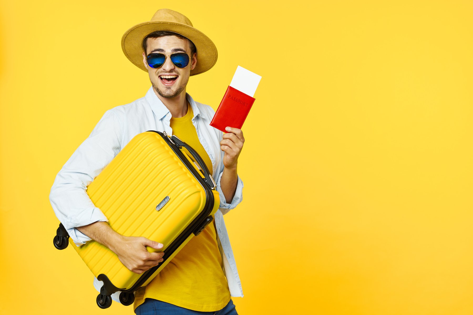 Suitcase with Clothes and Passport with Tickets in the Hands Traveler